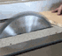 tablesaw: Virtually Unscathed! (A tablesaw in action. The blade disappears when it comes in contact with a hot dog.) tablesaw: A tablesaw in action. The blade disappears when it comes in contact with a hot dog. (Virtually Unscathed!)